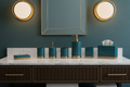 Full 6-piece deep teal resin bath set with brushed brass accents displayed on luxury bathroom vanity